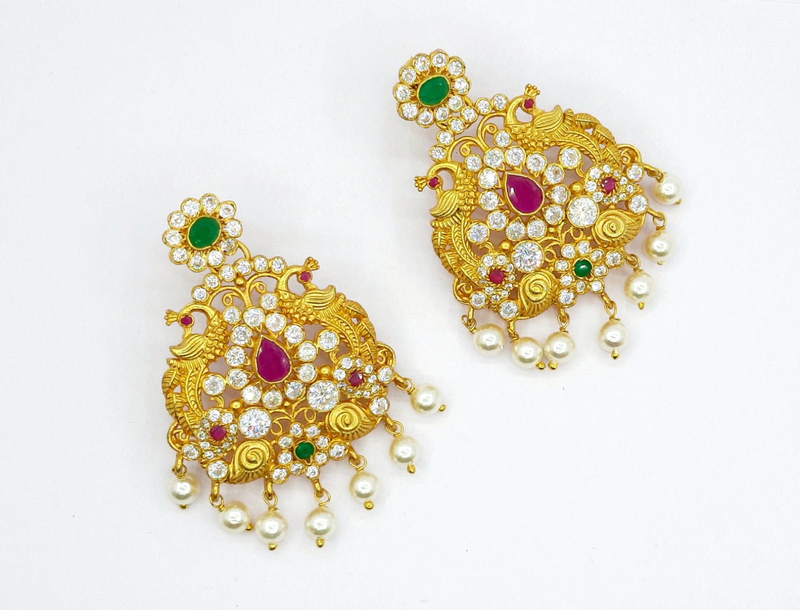 Regal Antique Design Gold Earrings with green and pink stone with delicate stone work.