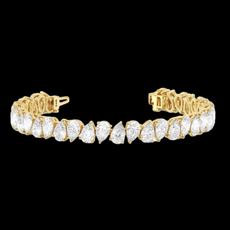 Glamorous Glow: The Luxurious Solitaire Pear Diamond Tennis Bracelet